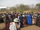 Greeted with singing at the airstrip in Dajo